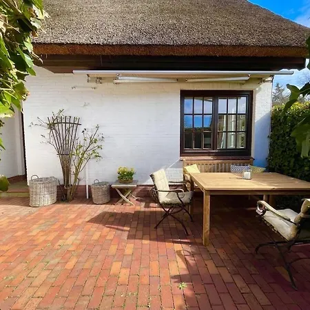 Rural Idyll Under Thatched Roof *